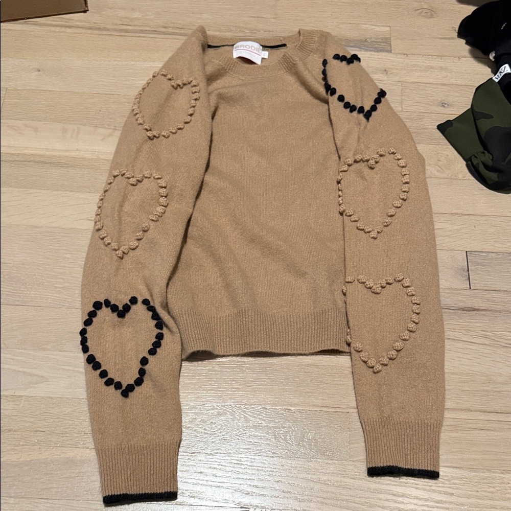 Brodie Cashmere Tan Sweater with Black Heart Accents